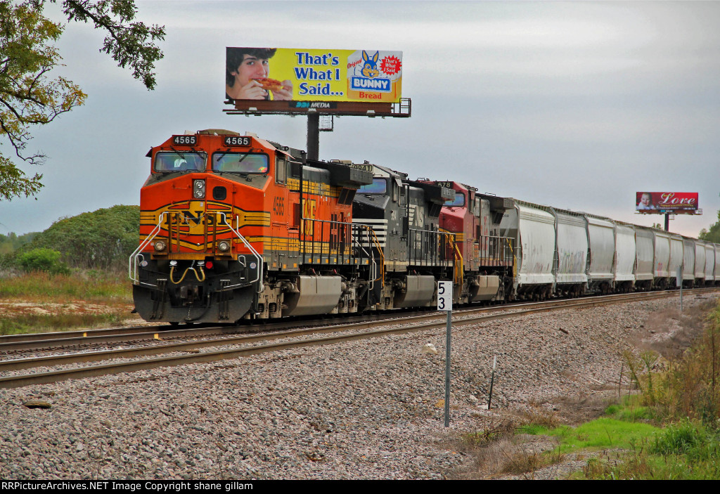 BNSF 4565 sits in the siding with good power.